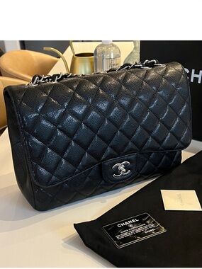 CHANEL Black Quilted Caviar Jumbo Flap Bag with Silver CC